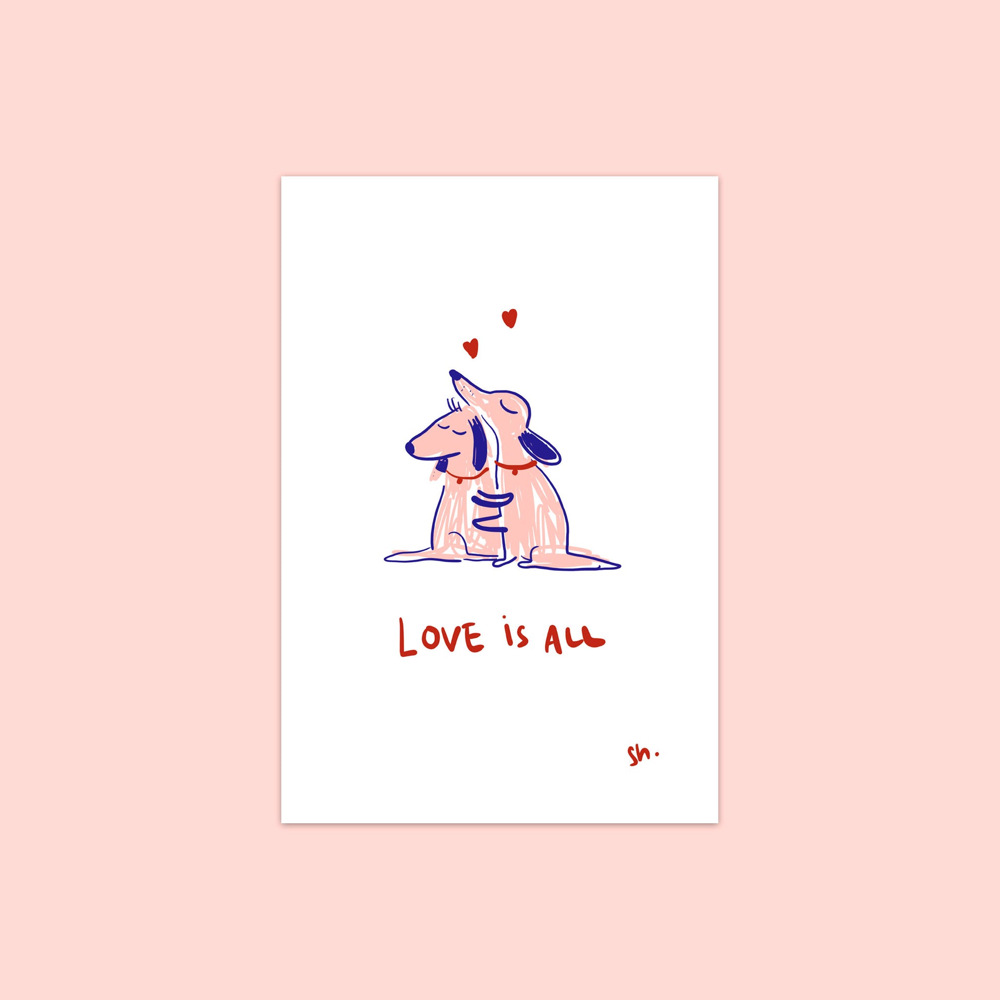 deux chiens se font un câlin avec écrit dessous à la main "love is all"
